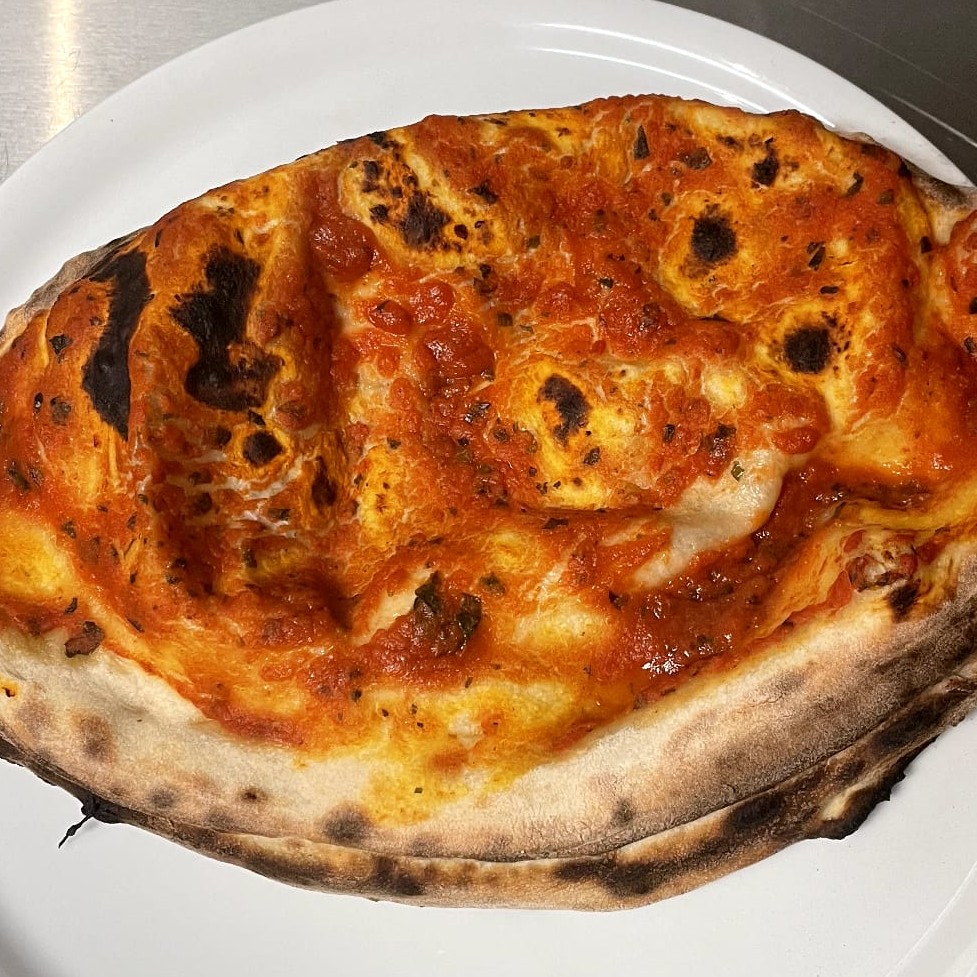 Pizza Calzone au feu de bois à Saverne