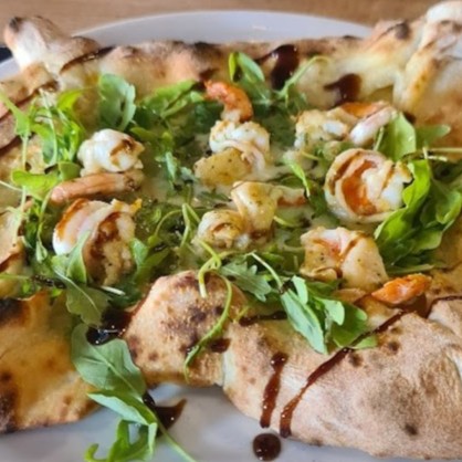 Pizza Crudo au feu de bois à Saverne avec jambon de Parme
